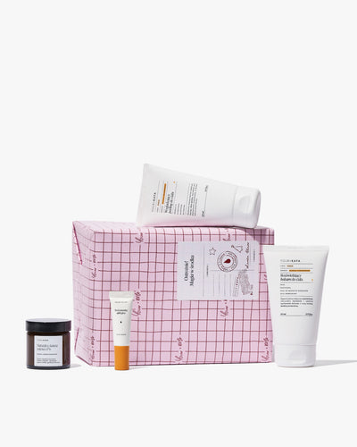 Zestaw świąteczny: peeling, balsam, olejek do ust i świeczka o zapachu słodkiej pomarańczy