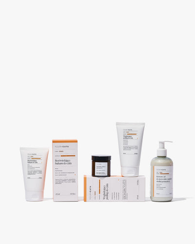 Zestaw świąteczny: balsam, peeling, żel pod prysznic i świeczka o zapachu słodkiej pomarańczy